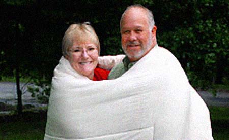 The blanket-wrapped couple in Uzzle's iconic Woodstock pix, Nick and Bobbi Ercoline of Bethel, NY, are still together 40 years down the Pike! - Click Here To Read NY Daily News' Jim Farber story!